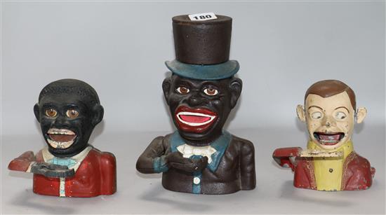 Three cast iron money banks 13cm - 21cm